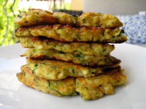 Pancakes made with shredded zucchini, onions and flour.